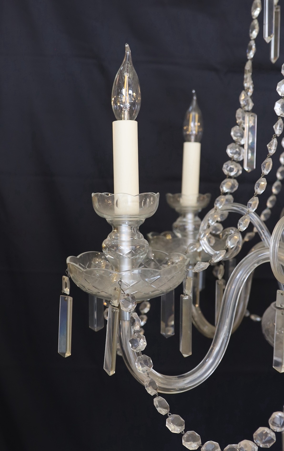 A 1930s Czech cut glass five light chandelier with octagonal bead and bayonet drops, height 100cm. width 65cm